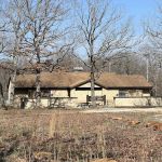 Piercing Arrow Shower House