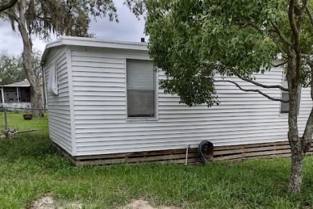 WE BUY Mobile HOMES WITH LAND CASH ANY CONDITION